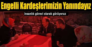 Engelli çocuğu bulunan aileyi ziyaret etti